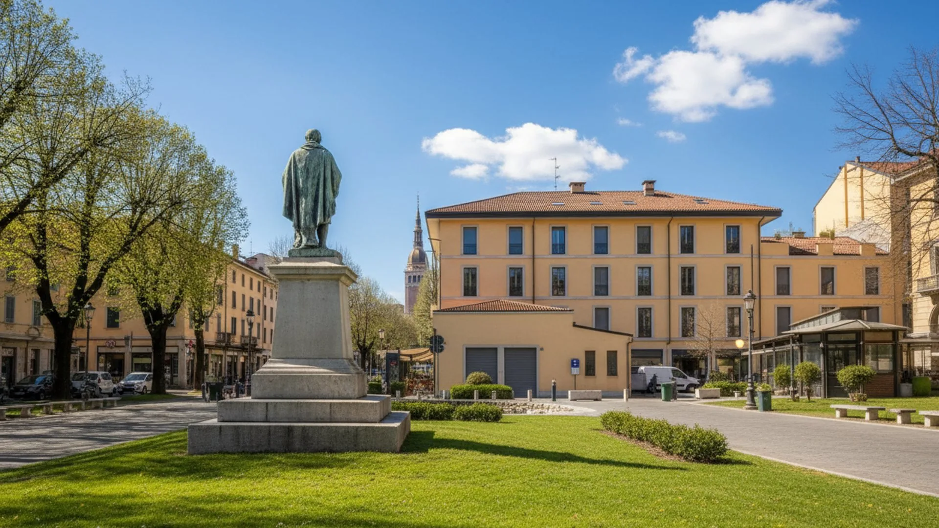 Un parco cittadino di Novara in una giornata limpida, con la cupola sullo sfondo